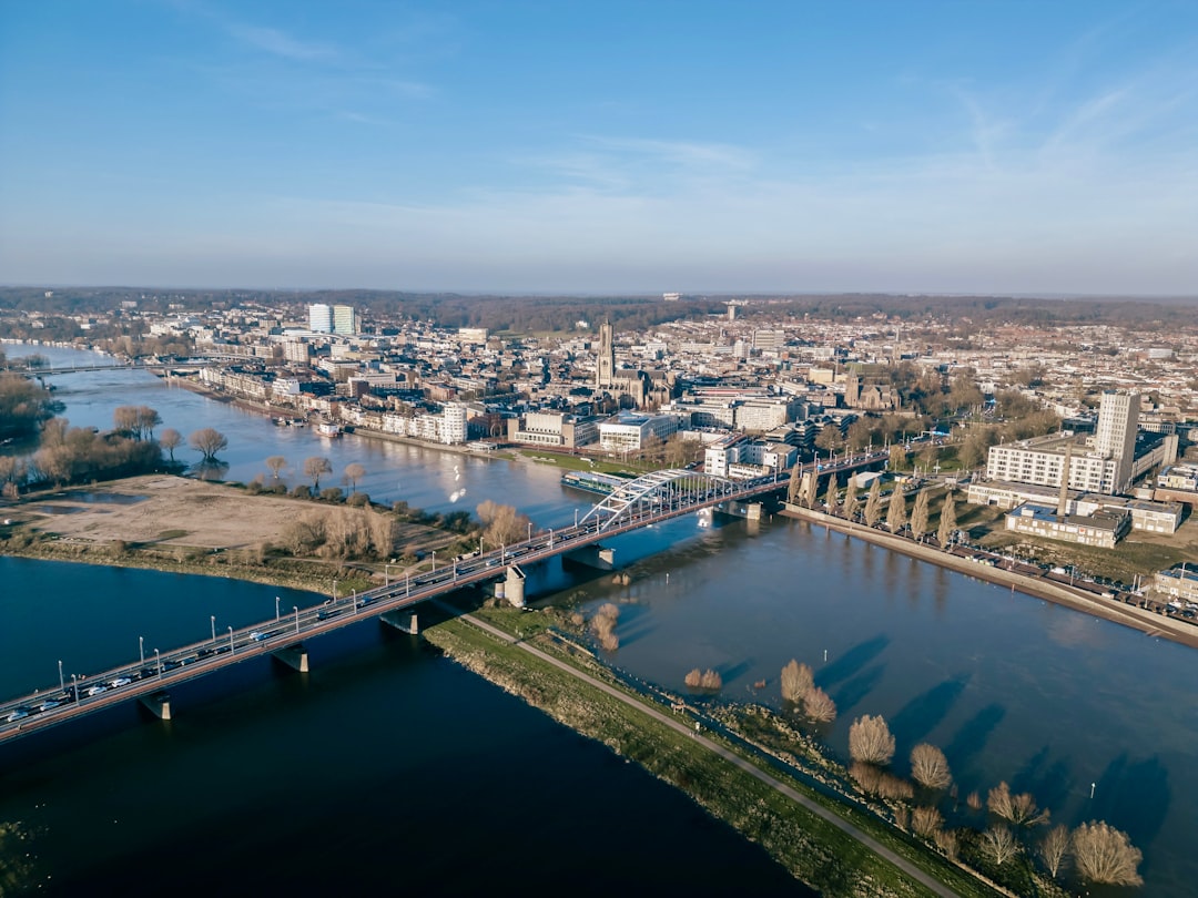 an-aerial-view-of-a-river-and-a-bridge-b3yofrdu-g8